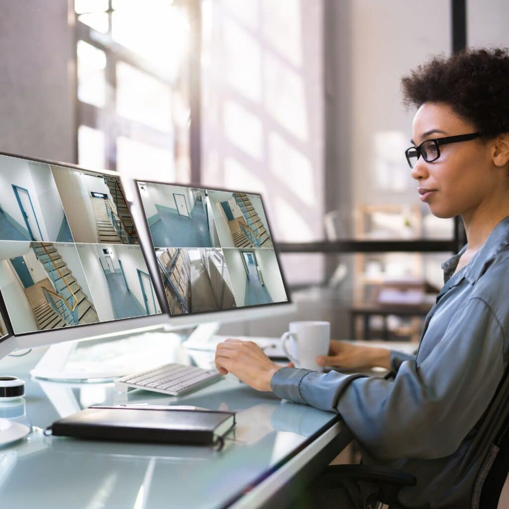 Woman reviewing surveillance footage